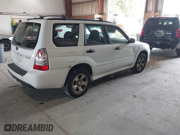 2007 Subaru Forester X with VIN JF1SG63637H736844, listed as a IAAI auction lot 40371482 with 166,328 mi miles. Bid and sale history available at carsss.com. Image 4.