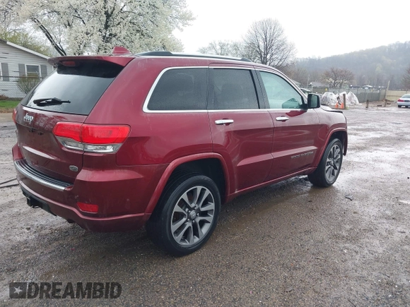 2017 Jeep Grand Cherokee Overland with VIN 1C4RJFCG5HC854024, listed as a IAAI auction lot 42006307 with 118,640 mi miles. Bid and sale history available at carsss.com. Image 4.