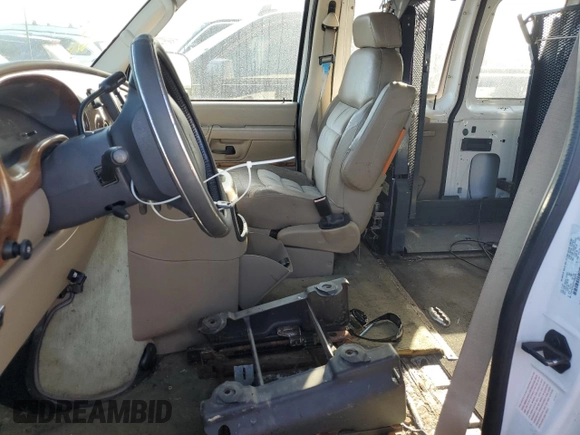 2003 Ford Econoline Cargo Recreational with VIN 1FDPE24LX3HA52446, listed as a Copart auction lot 77249664 with 109,911 mi miles and Non Repairable. Bid and sale history available at DreamBid. Image 7.