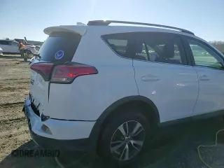 2018 Toyota RAV4 XLE with VIN 2T3WFREV2JW454202, listed as a Copart auction lot 41599855 with 144,442 mi miles and Salvage title. Bid and sale history available at DreamBid. Image 14.