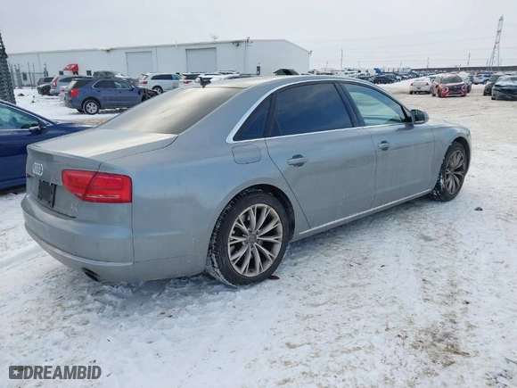 2012 Audi A8 L with VIN WAURVAFD8CN017206, listed as a IAAI auction lot 41626707 with 138,922 mi miles. Bid and sale history available at carsss.com. Image 4.
