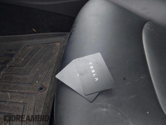 2019 Tesla Model 3 Mid Range with VIN 5YJ3E1EA3KF307415, listed as a IAAI auction lot 41673239 with 42,895 mi miles and . Bid and sale history available at DreamBid. Image 11.