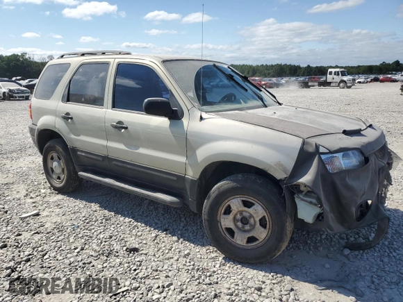 2004 Ford Escape with VIN 1FMCU02194DA23228, listed as a Copart auction lot 72161464 with 167,233 mi miles and Salvage title. Bid and sale history available at DreamBid. Image 4.