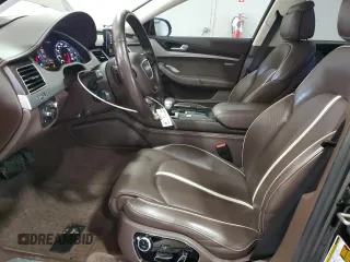 2016 Audi A8 Sport z VIN WAU43AFD1GN011589, wystawiony jako Copart lot #86614934 z przebiegiem 96 137 mil mil oraz Szkoda całkowita • Salvage title. Historia ofert i sprzedaży dostępna na DreamBid. Obrazek 7.