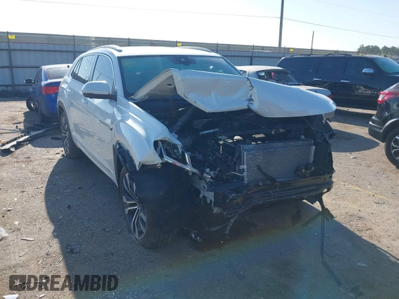 2022 Volkswagen Atlas SEL Premium R-Line with VIN 1V2FE2CA6NC220596, listed as a IAAI auction lot 41864407 with 13,120 mi miles and . Bid and sale history available at DreamBid. Image 1.