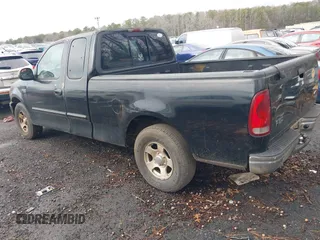 2002 Ford F-150 XL with VIN 1FTRX17252NA19861, listed as a IAAI auction lot 41304648 with 279,277 mi miles. Bid and sale history available at carsss.com. Image 3.