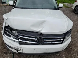 2019 Volkswagen Tiguan S z VIN 3VV0B7AX4KM034250, wystawiony jako Copart lot #60025375 z przebiegiem 116 778 mil mil oraz Czysty tytuł • Clean title. Historia ofert i sprzedaży dostępna na DreamBid. Obrazek 12.