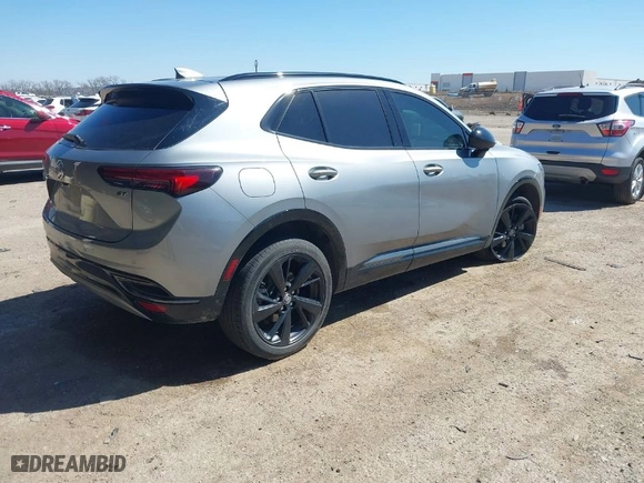2023 Buick Envision Essence with VIN LRBFZNR42PD018598, listed as a IAAI auction lot 41761411 with 65,685 mi miles. Bid and sale history available at carsss.com. Image 4.