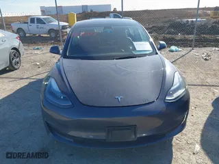 2023 Tesla Model 3 with VIN 5YJ3E1EA3PF678825, listed as a IAAI auction lot 41283153 with 8,607 mi miles. Bid and sale history available at carsss.com. Image 12.