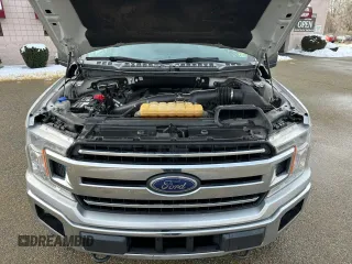 2018 Ford F-150 XL with VIN 1FTEW1EG5JFD16525, listed as a Copart auction lot 52920785 with 202,325 mi miles and Clean Title. Bid and sale history available at carsss.com. Image 7.