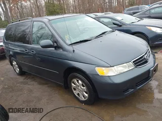 2004 Honda Odyssey EX z VIN 5FNRL18604B068111, wystawiony jako IAAI lot #41534201 z przebiegiem 148 521 mil mil oraz . Historia ofert i sprzedaży dostępna na DreamBid. Obrazek 1.
