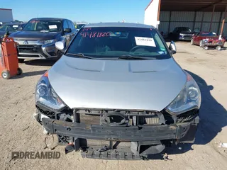 2013 Hyundai Veloster Turbo with VIN KMHTC6AE6DU162372, listed as a IAAI auction lot 41481820 with 105,650 mi miles and . Bid and sale history available at DreamBid. Image 12.
