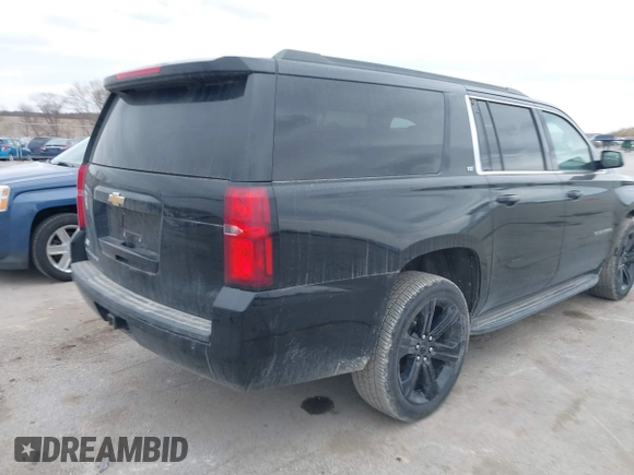 2019 Chevrolet Suburban LT with VIN 1GNSKHKC7KR192984, listed as a IAAI auction lot 41833683 with 176,406 mi miles and . Bid and sale history available at DreamBid. Image 4.