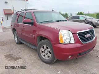 2007 GMC Yukon SLT z VIN 1GKFK13047J113285, wystawiony jako IAAI lot #42597518 z przebiegiem 116 626 mil mil oraz . Historia ofert i sprzedaży dostępna na DreamBid. Obrazek 1.