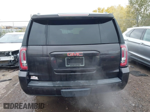 2015 GMC Yukon XL SLT with VIN 1GKS1HKC8FR219289, listed as a IAAI auction lot 40772496 with 163,477 mi miles. Bid and sale history available at carsss.com. Image 16.