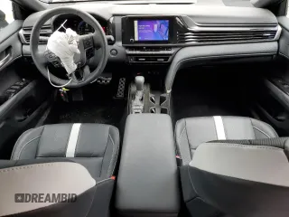 2025 Toyota Camry LE z VIN 4T1DAACK6SU027261, wystawiony jako Copart lot #53074595 z przebiegiem 9 774 mil mil oraz Szkoda całkowita • Salvage title. Historia ofert i sprzedaży dostępna na DreamBid. Obrazek 8.