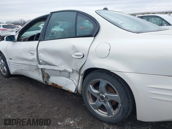 2004 Pontiac Bonneville SLE z VIN 1G2HY52K54U215710, wystawiony jako IAAI lot #41497635 z przebiegiem 123 343 mil mil oraz . Historia ofert i sprzedaży dostępna na DreamBid. Obrazek 12.