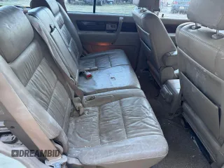 2001 Isuzu Trooper S z VIN JACDJ58X417J03071, wystawiony jako Copart lot #77033444 z przebiegiem 151 982 mil mil oraz Szkody całkowita. Historia ofert i sprzedaży dostępna na DreamBid. Obrazek 6.