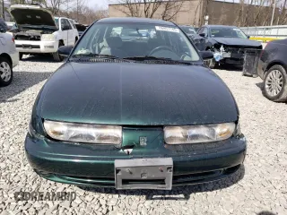 1997 Saturn SW z VIN 1G8ZK8275VZ129102, wystawiony jako Copart lot #48857145 z przebiegiem 76 836 mil mil oraz Tytuł czysty. Historia ofert i sprzedaży dostępna na DreamBid. Obrazek 5.