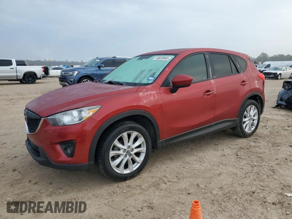 2013 Mazda CX-5 Grand Touring with VIN JM3KE2DE7D0129703, listed as a Copart auction lot 46620955 with 124,228 mi miles and Salvage Title. Bid and sale history available at carsss.com. Image 1.