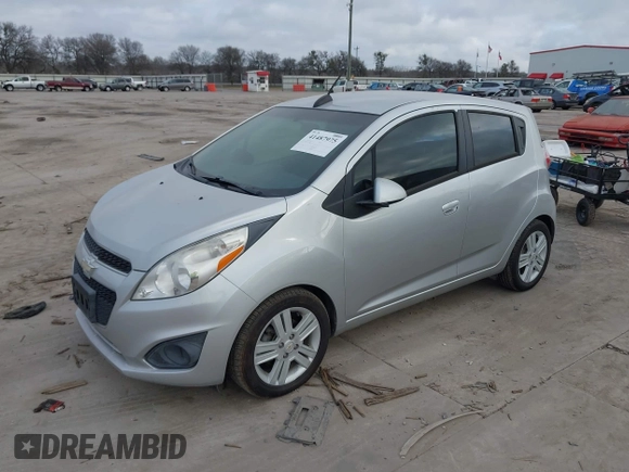 2015 Chevrolet Spark LS with VIN KL8CB6S95FC736907, listed as a IAAI auction lot 42170458 with 102,915 mi miles and . Bid and sale history available at DreamBid. Image 2.