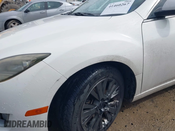 2009 Mazda 6 i Touring with VIN 1YVHP82A695M33478, listed as a IAAI auction lot 41460267 with 154,723 mi miles and . Bid and sale history available at carsss.com. Image 6.