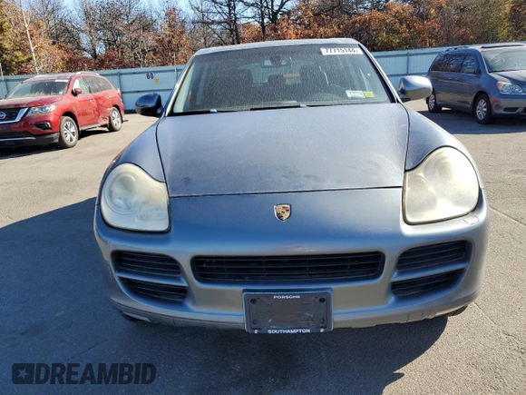 2005 Porsche Cayenne S with VIN WP1AB29P05LA62657, listed as a Copart auction lot 77715144 with 28,210 mi miles and Clean Title. Bid and sale history available at carsss.com. Image 5.