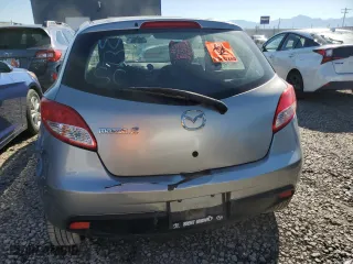 2011 Mazda Mazda2 Sport with VIN JM1DE1HY5B0120205, listed as a Copart auction lot 71291954 with 0 mi miles and Salvage Title. Bid and sale history available at carsss.com. Image 6.