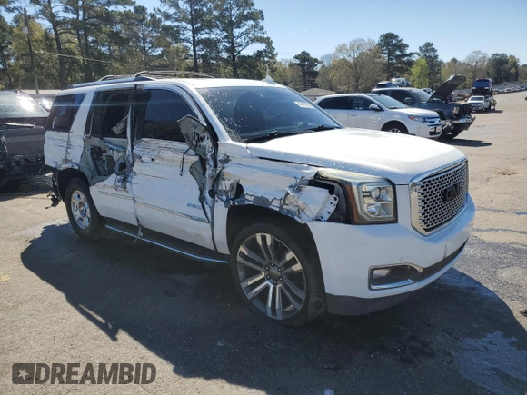 2015 GMC Yukon Denali with VIN 1GKS1CKJ9FR566390, listed as a Copart auction lot 48472835 with 167,719 mi miles and Salvage Title. Bid and sale history available at carsss.com. Image 4.