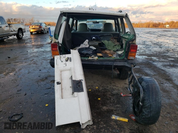 1995 Jeep Cherokee SE с VIN 1J4FT28S1SL634660, выставлен на аукционе Copart как лот 41530075 с пробегом Не указан миль и Списание • Salvage title. История ставок и продаж доступна на DreamBid. Изображение 6.