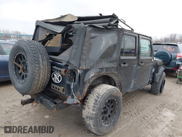 2008 Jeep Wrangler Unlimited X with VIN 1J4GA39138L641138, listed as a IAAI auction lot 41986230 with 215,026 mi miles. Bid and sale history available at carsss.com. Image 4.