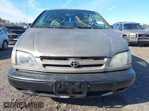 1999 Toyota Sienna LE with VIN 4T3ZF13CXXU121819, listed as a IAAI auction lot 41607624 with 999,999 mi miles. Bid and sale history available at carsss.com. Image 6.