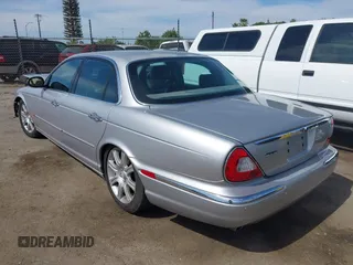 2004 Jaguar XJ 8 with VIN SAJEA71C74SG11470, listed as a IAAI auction lot 42032116 with 209,821 mi miles and . Bid and sale history available at DreamBid. Image 3.