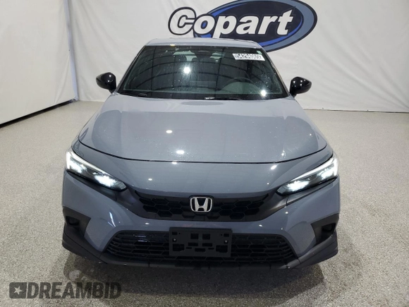 2023 Honda Civic Sport z VIN 19XFL2H89PE020319, wystawiony jako Copart lot #54294065 z przebiegiem 11 192 mil mil oraz Czysty tytuł • Clean title. Historia ofert i sprzedaży dostępna na DreamBid. Obrazek 5.