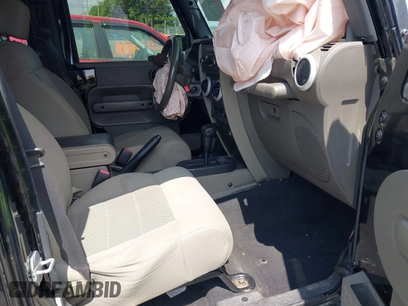 2008 Jeep Wrangler Unlimited Sahara with VIN 1J4GA59128L608515, listed as a IAAI auction lot 42627584 with 157,821 mi miles and . Bid and sale history available at DreamBid. Image 5.