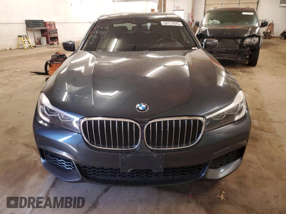 2019 BMW 7 Series 740i xDrive with VIN WBA7E4C51KGV70174, listed as a Copart auction lot 54117075 with 48,743 mi miles and Salvage Title. Bid and sale history available at carsss.com. Image 5.
