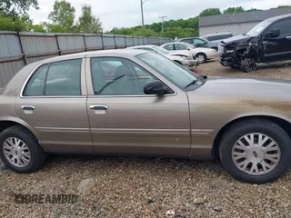 2004 Ford Crown Victoria LX с VIN 2FAFP74W74X114961, выставлен на аукционе IAAI как лот 42347867 с пробегом 170 867 миль миль и . История ставок и продаж доступна на DreamBid. Изображение 13.