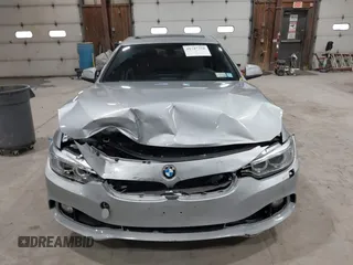2016 BMW 4 Series 428i xDrive with VIN WBA4C9C5XGG138843, listed as a IAAI auction lot 41747358 with 63,804 mi miles and . Bid and sale history available at DreamBid. Image 12.