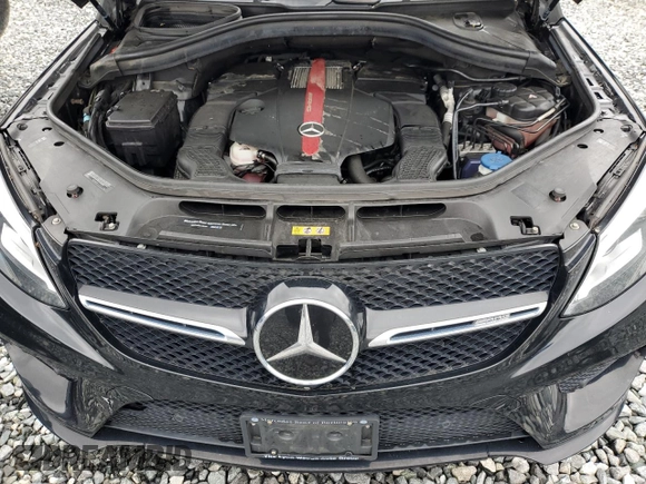 2019 Mercedes-Benz GLE 43 AMG with VIN 4JGED6EB5KA137564, listed as a Copart auction lot 57213595 with 104,144 mi miles and Salvage title. Bid and sale history available at DreamBid. Image 12.