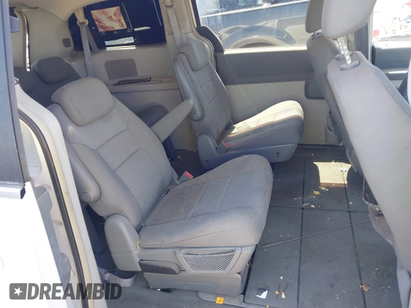 2009 Chrysler Town & Country LX with VIN 2A8HR44E79R549129, listed as a IAAI auction lot 42079369 with 102,805 mi miles. Bid and sale history available at carsss.com. Image 8.