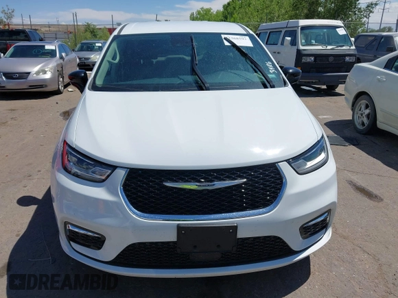 2024 Chrysler Pacifica Hybrid Select with VIN 2C4RC1S74RR153420, listed as a IAAI auction lot 42368593 with 19,829 mi miles and . Bid and sale history available at DreamBid. Image 12.