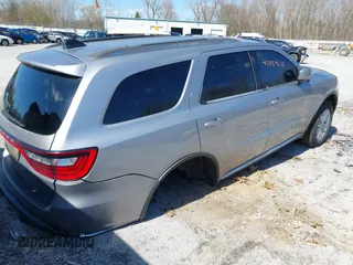 2014 Dodge Durango SXT z VIN 1C4RDJAG4EC514677, wystawiony jako IAAI lot #42059637 z przebiegiem 226 185 mil mil oraz . Historia ofert i sprzedaży dostępna na DreamBid. Obrazek 4.