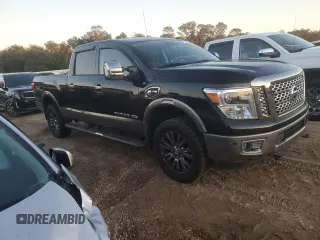 2016 Nissan Titan XD Platinum Reserve with VIN 1N6BA1F27GN512465, listed as a Copart auction lot 80720764 with 132,037 mi miles and Clean Title. Bid and sale history available at carsss.com. Image 4.