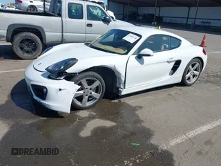 2015 Porsche Cayman with VIN WP0AA2A86FK163282, listed as a IAAI auction lot 42001118 with 101,495 mi miles and . Bid and sale history available at DreamBid. Image 2.