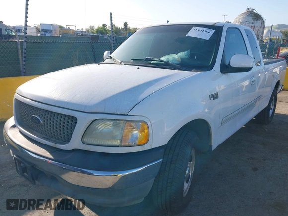 2002 Ford F-150 XL with VIN 1FTRX17292NB12320, listed as a IAAI auction lot 41904506 with 89,191 mi miles. Bid and sale history available at carsss.com. Image 2.