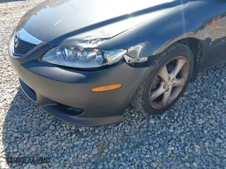 2005 Mazda Mazda6 i with VIN 1YVFP80C755M22933, listed as a IAAI auction lot 41690663 with 220,301 mi miles. Bid and sale history available at carsss.com. Image 6.
