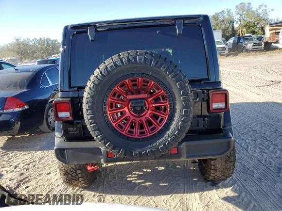 2023 Jeep Wrangler Rubicon z VIN 1C4HJXFN3PW618061, wystawiony jako Copart lot #81957524 z przebiegiem 25 880 mil mil oraz Szkoda całkowita • Salvage title. Historia ofert i sprzedaży dostępna na DreamBid. Obrazek 6.