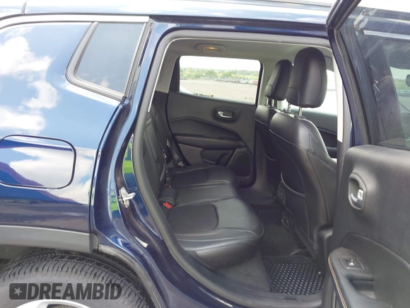2018 Jeep Compass Latitude with VIN 3C4NJDBB2JT150463, listed as a IAAI auction lot 42452301 with 73,895 mi miles and . Bid and sale history available at DreamBid. Image 8.