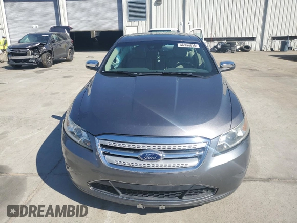 2011 Ford Taurus Limited с VIN 1FAHP2JW5BG132894, выставлен на аукционе Copart как лот 46996815 с пробегом 76 980 миль миль и Списание • Salvage title. История ставок и продаж доступна на DreamBid. Изображение 5.