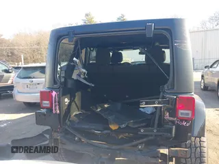2018 Jeep Wrangler JK Unlimited Sahara with VIN 1C4HJWEG8JL921293, listed as a IAAI auction lot 41413264 with 90,566 mi miles. Bid and sale history available at carsss.com. Image 17.